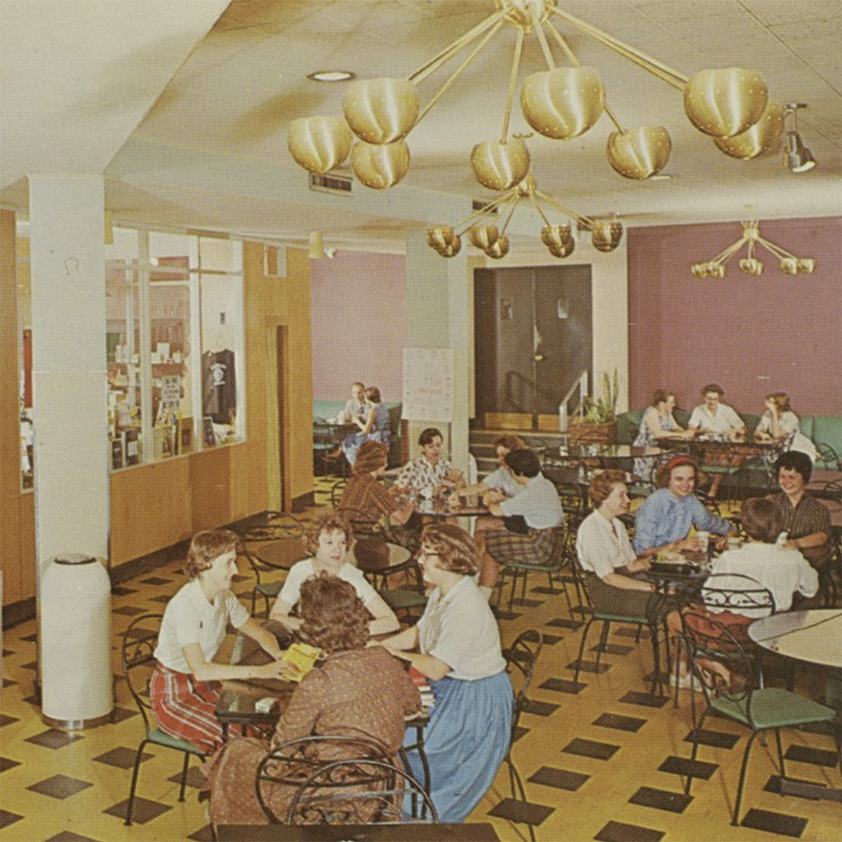 Vintage photograph of a dining hall on campus in the 1950s